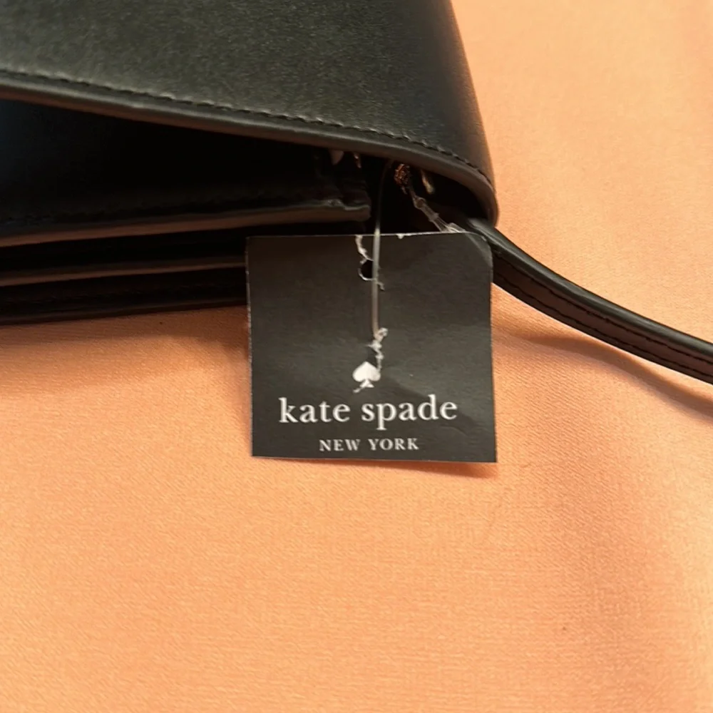 New Kate Spade leather handbag. Black. Dust Bag Included.